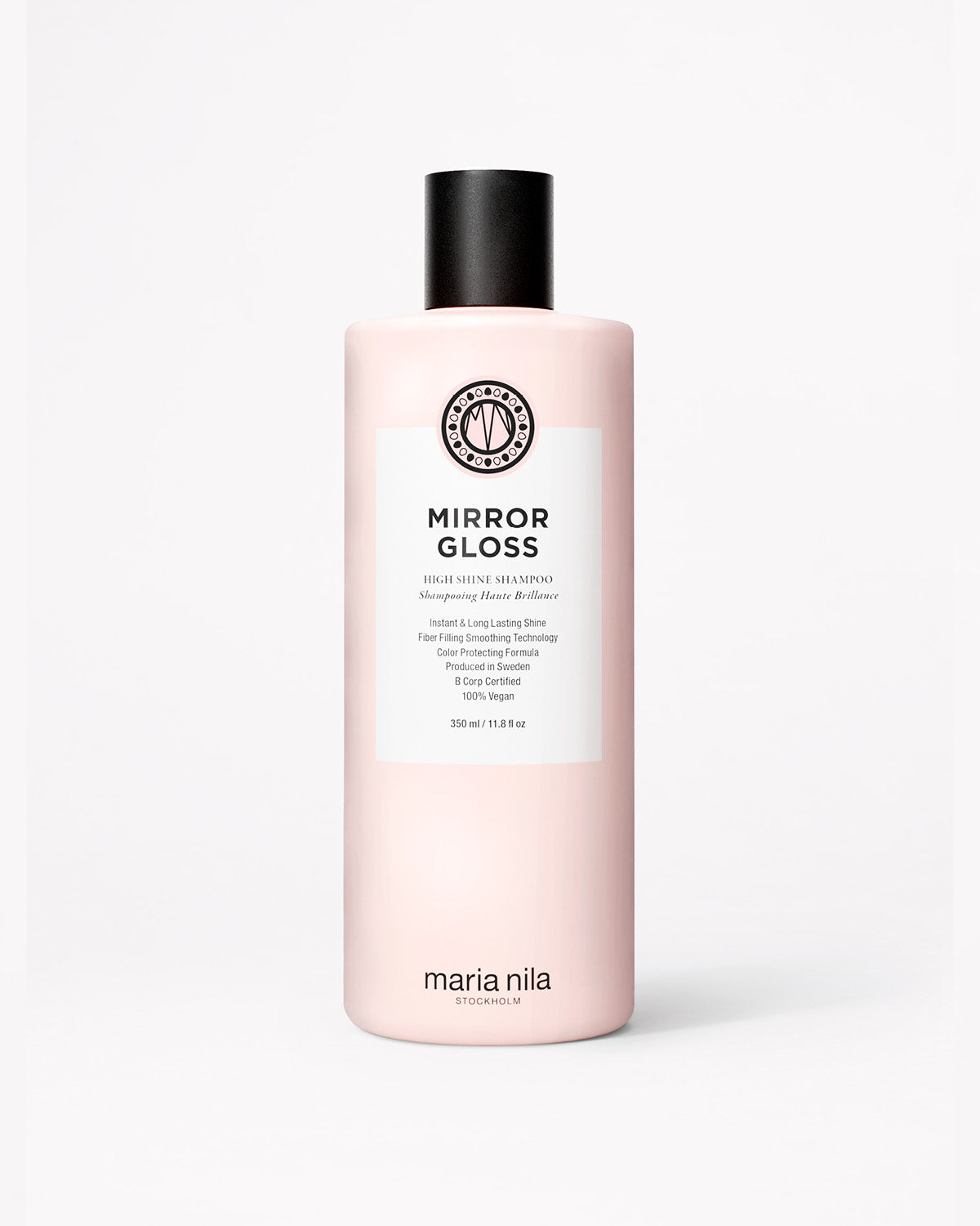 Pink bottle of Maria Nila Mirror Gloss Shampoo on a white background