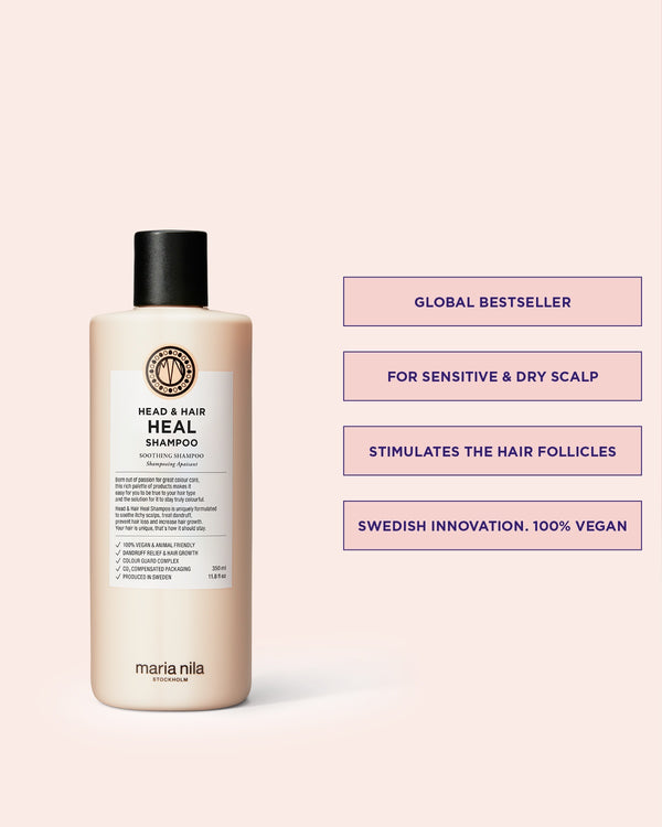 Head & Hair Heal Shampoo bottle with rich lather