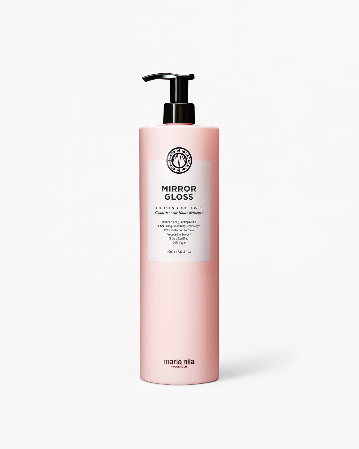 Pink bottle of Maria Nila Mirror Gloss Conditioner Liter on a white background