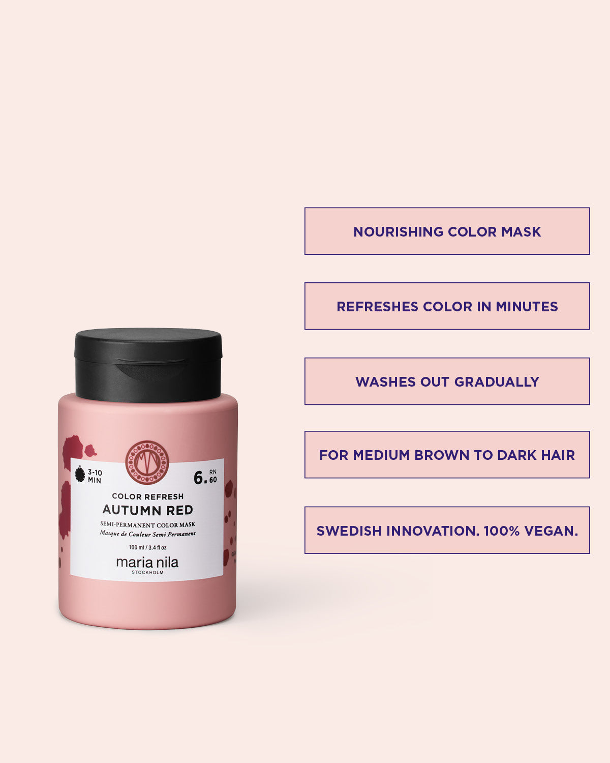 Pink hair mask jar with black lid on a light pink background, featuring product details.